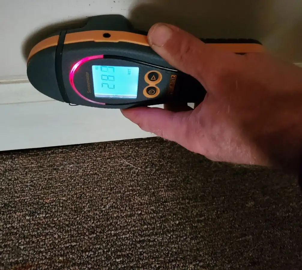 Moisture detection at baseboard during Burst Pipe Cleanup in Pepper Pike